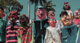 Tradición de la mascarada tradicional costarricense: celebración llena de color, música y cultura que perdura desde la colonia hasta hoy.